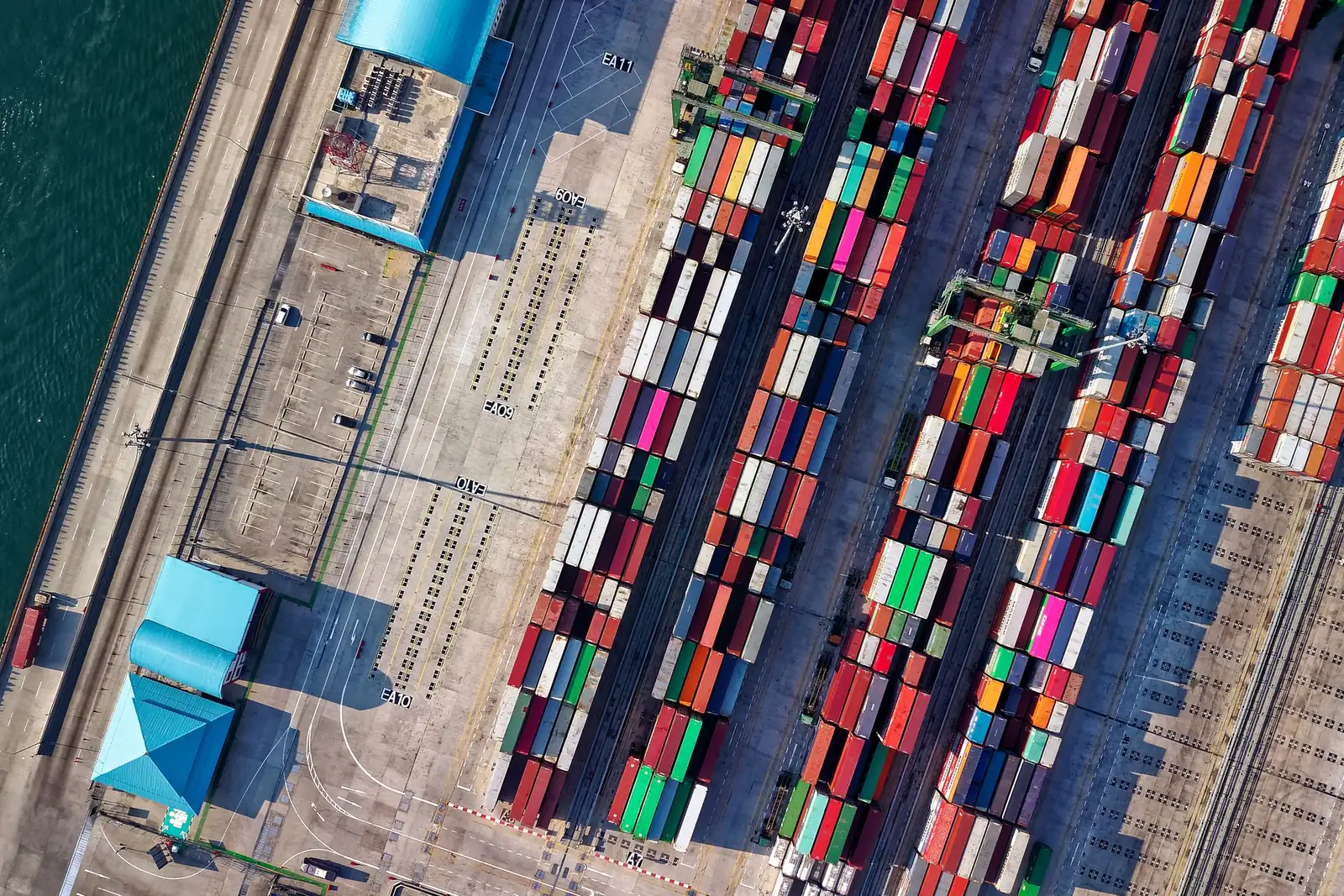 A Q-Onetrade container on the apron of a port terminal.